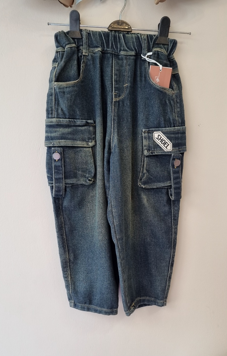 شلوار جین نیمه مام بغل جیب دار سورمه ای تیره دخترانه و پسرانه